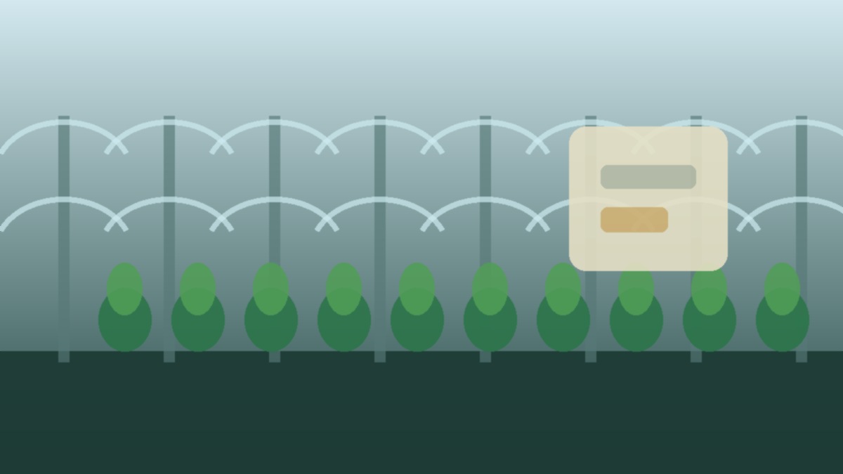A modern automated irrigation system spraying water over nursery stock